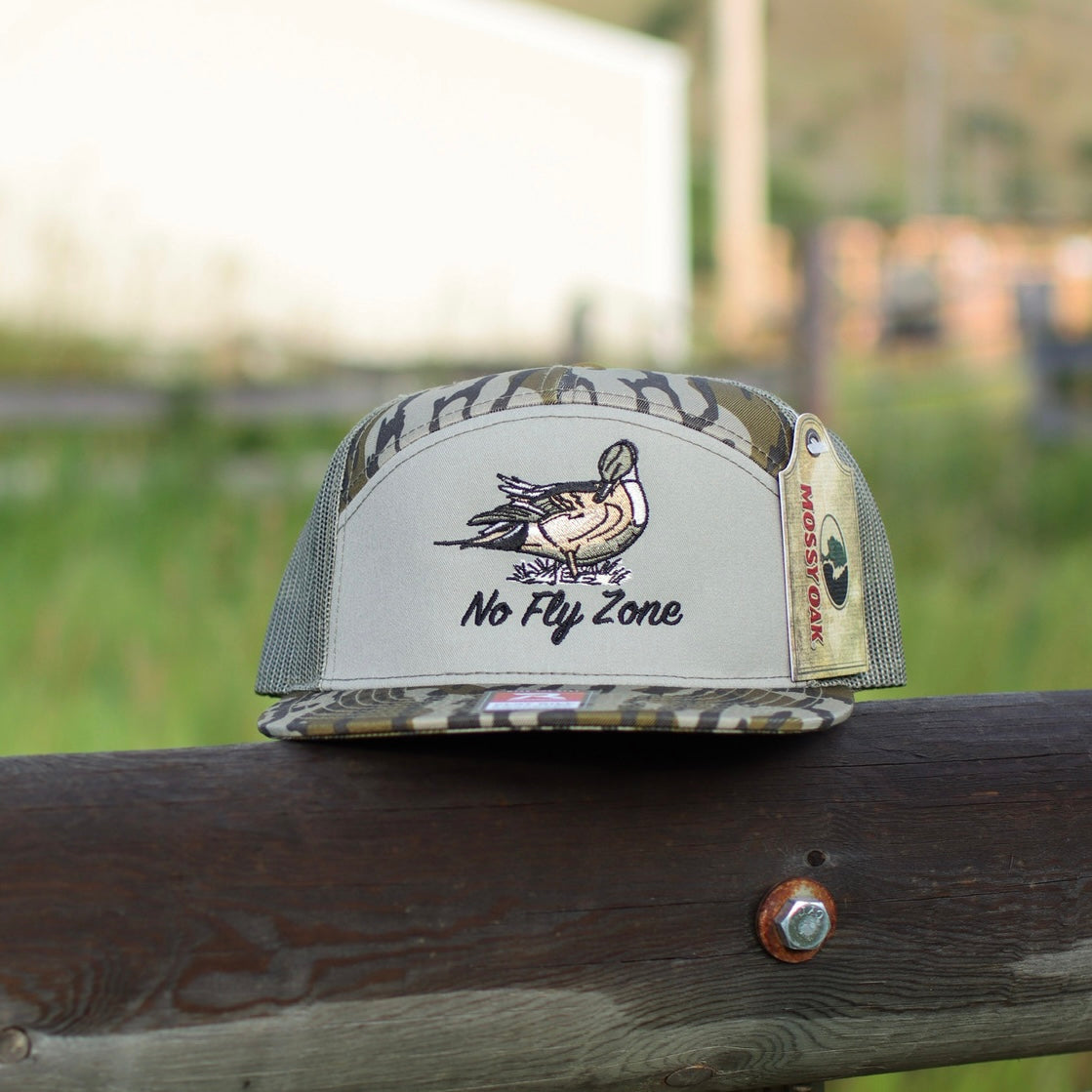 camo and gray pintail 7 panel hat by no fly zone waterfowl on fence post